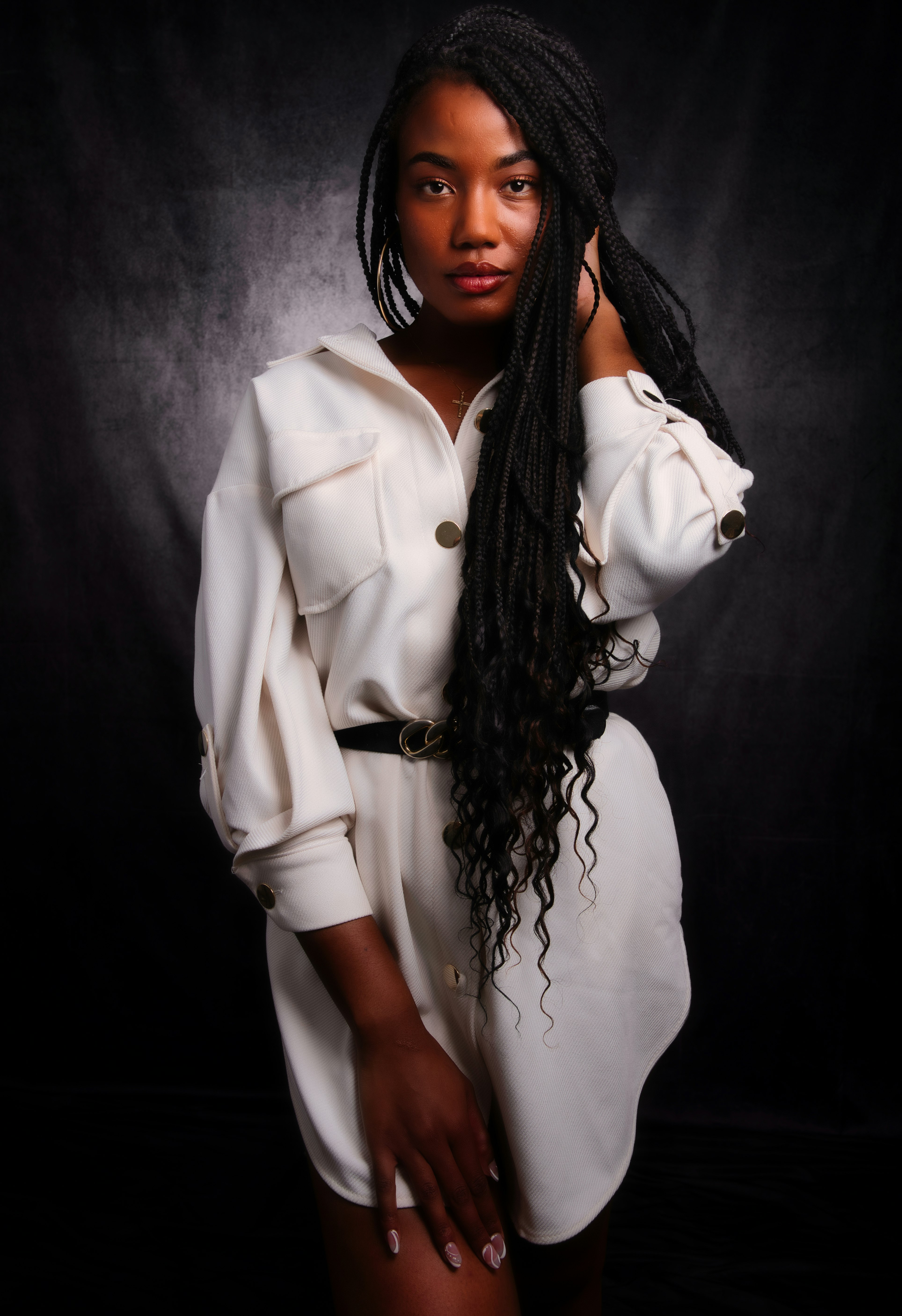 woman in white dress shirt and black scarf